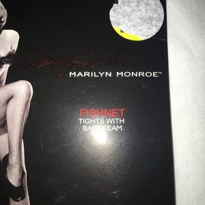 Marilyn Monroe Accessories - NWT Marilyn Monroe black/red fishnet stockings Marilyn Monroe Accessories - NWT Marilyn Monroe black/red fishnet stockings